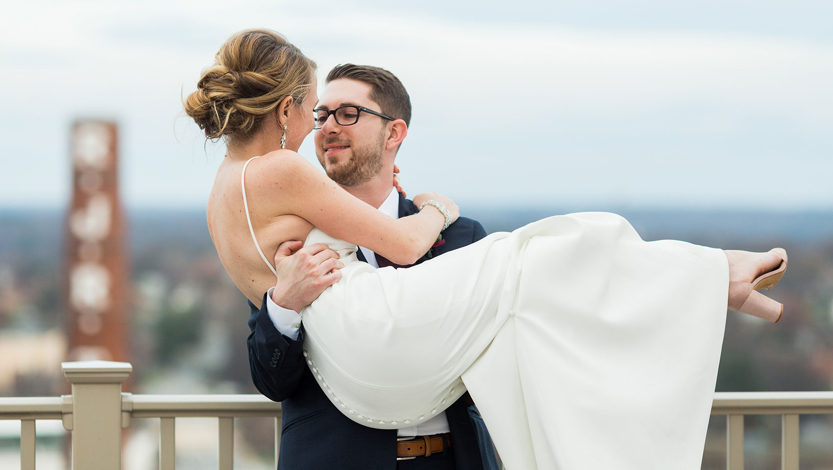 Holding Bride on Terrace