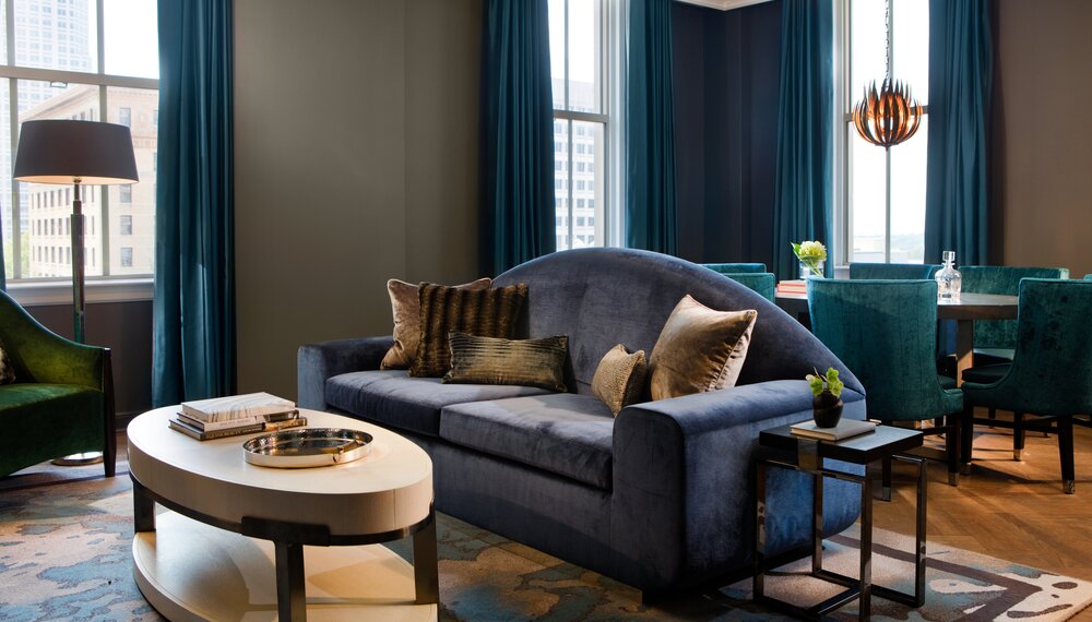 Suite living area at Kimpton Cardinal Hotel