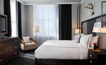 Spacious guest room at Kimpton Cardinal Hotel