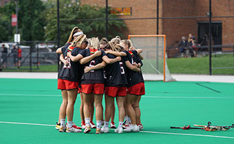 Lacrosse Players in a huddle